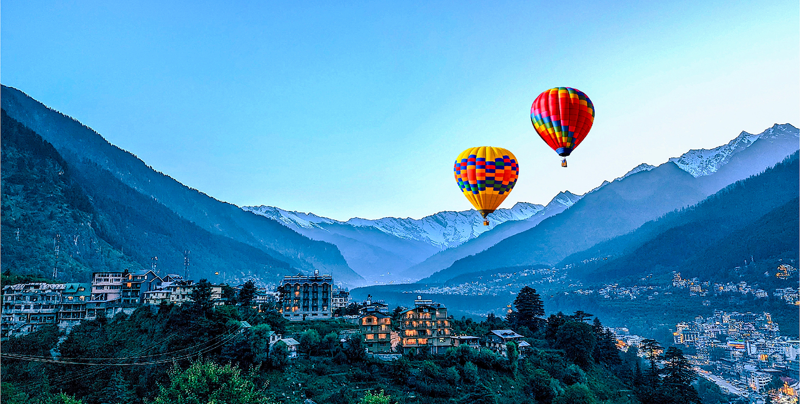 Hot balloon air over Manali, beautiful little town in Himalayas in Himachal India.