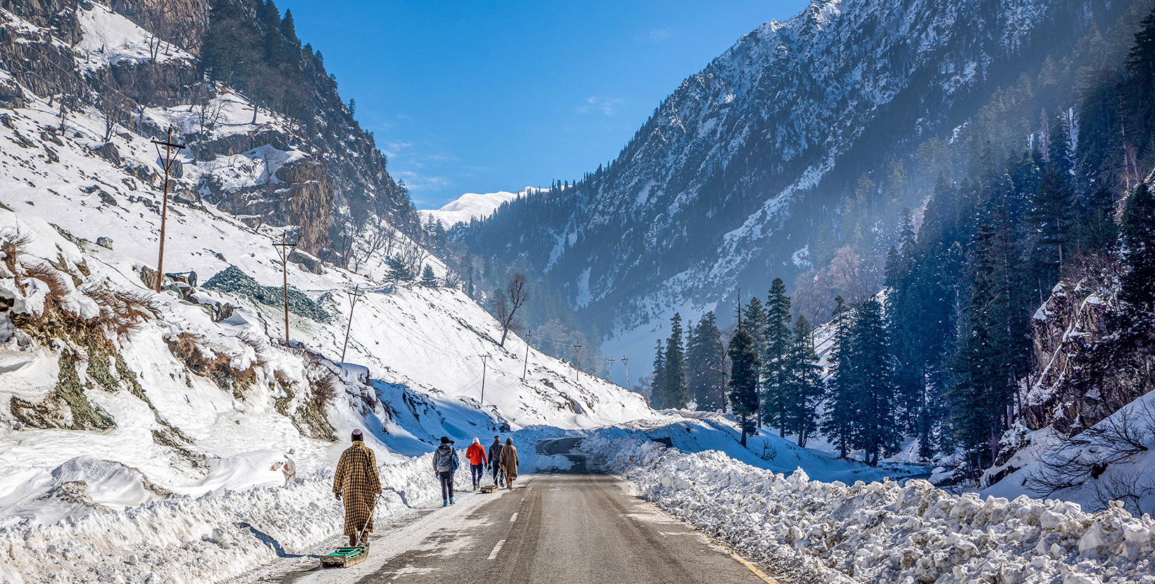 Beautiful view of sonmarg in winter, Snow covered Himalayan Mountains with pine trees and river, Kashmir