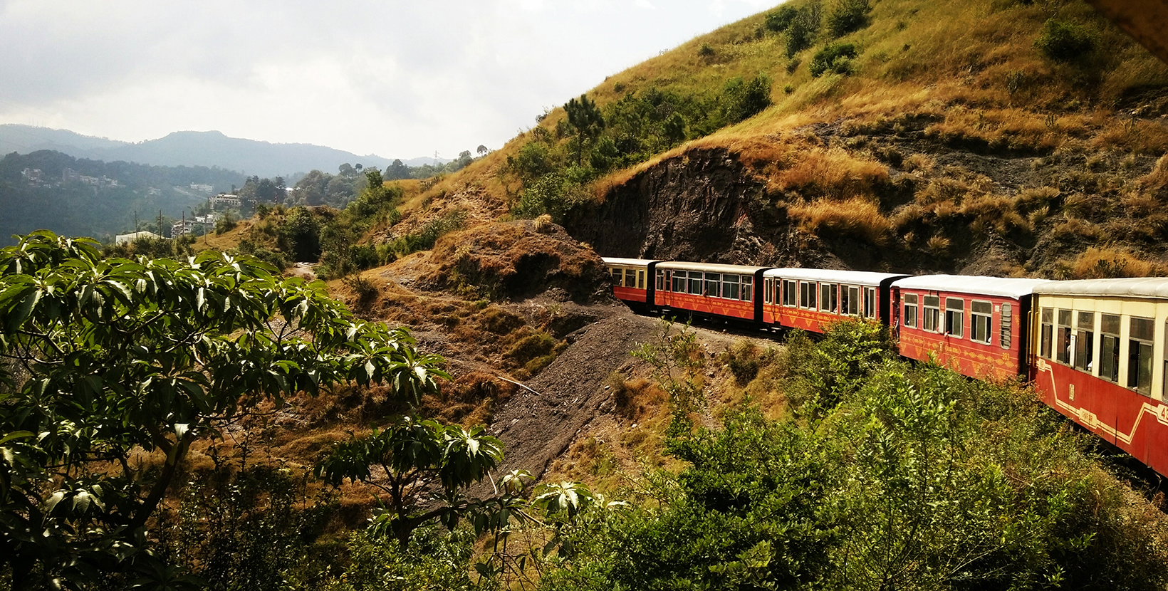 Himalayan Queen toy train between Kalka and Shimla As the train ascends through steep mountains and curves