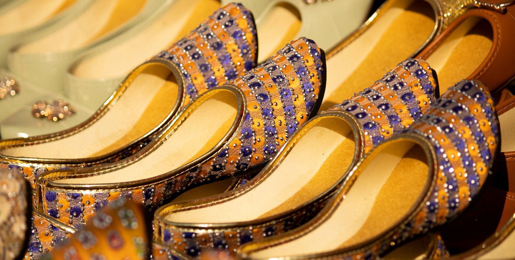 Indian traditional Colorful Punjabi Jutti shoes stall background