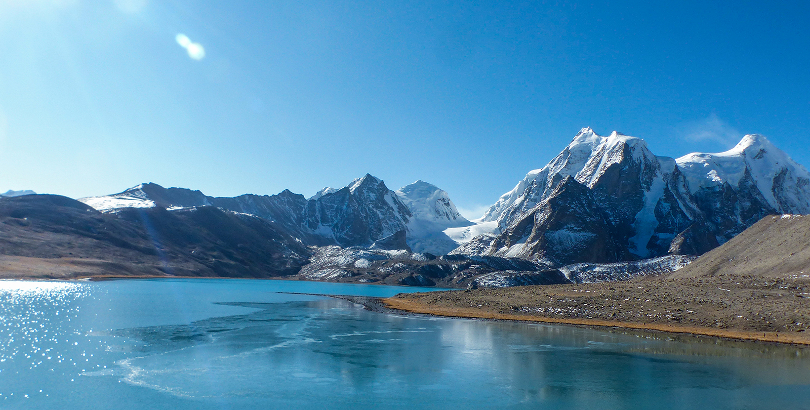 Beautiful view of Gurudongmar lake in North Sikkim, India. Snowy Himalayan mountain are seen in background.