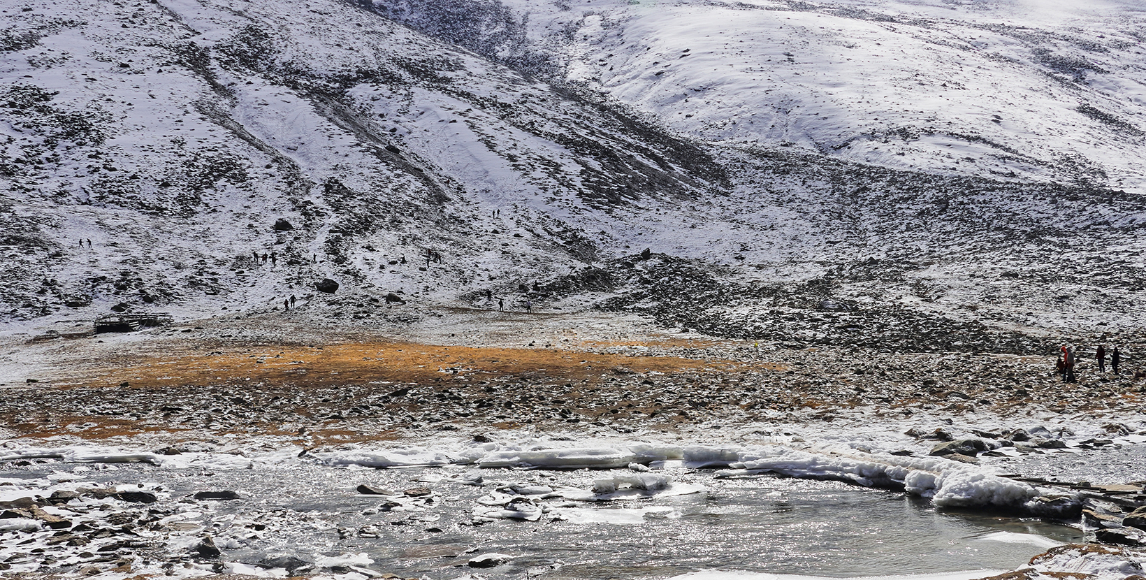 snowy zero point, beautiful alpine valley is popular tourist place in north sikkim, in india. mountain river lachung chu flowing through the valley